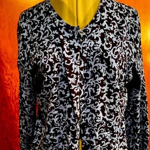 Karen Scott sweater with blue filigree pattern